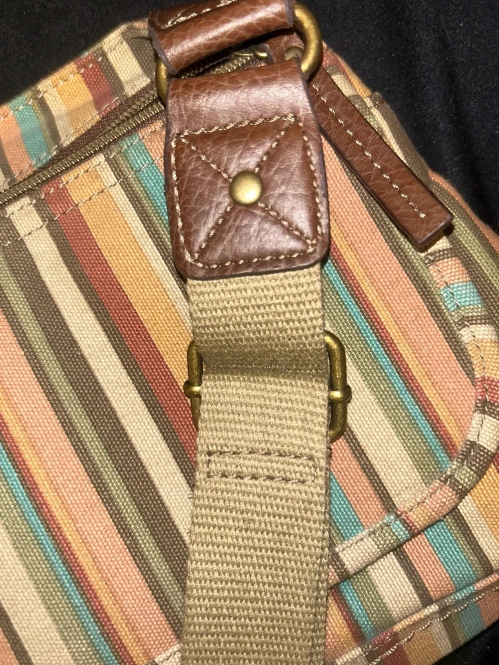 Relic Messenger canvas crossbody Bag In A Beautiful Striped Pattern.